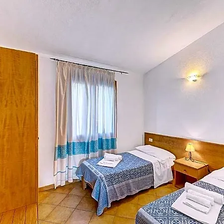 Апартаменты The Fantastic Residenza Badus 2 Bedroom Sleeps 6 Child